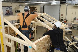 Picture of students in the Fundamentals of Construction course building a shed