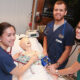 three nursing students in simulator lab