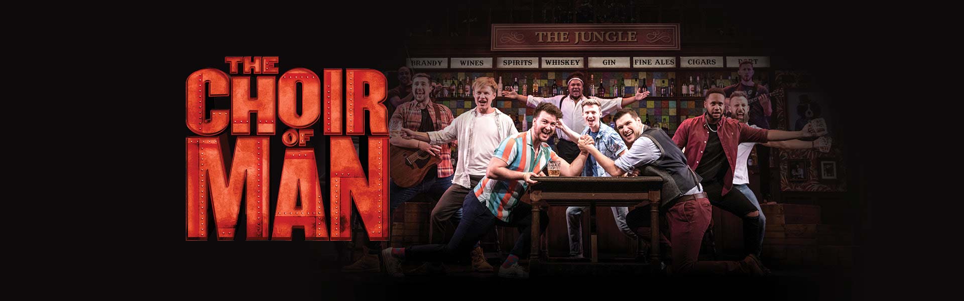 Picture of the cast of Choir of Man arm wrestling