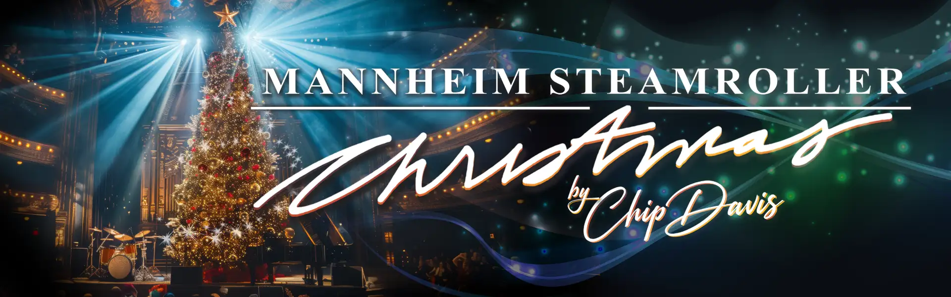 Promotional image for 'Mannheim Steamroller Christmas by Chip Davis,' featuring a decorated Christmas tree with stage lights shining down and musical instruments set up on stage.