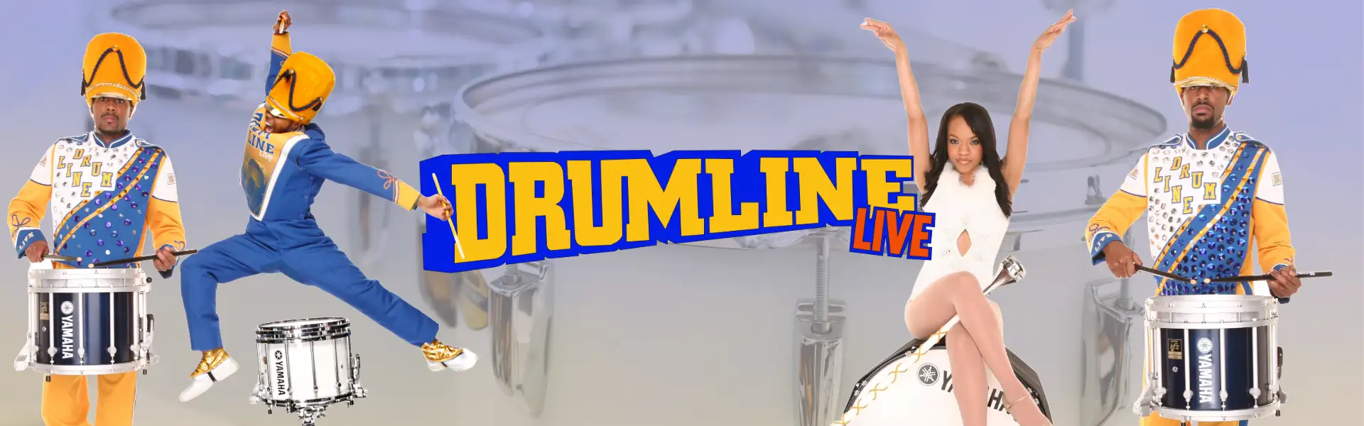 Promotional image for DRUMLine Live, featuring two drummers in colorful uniforms, a dancer posing with a drum, and a performer leaping in the air, with the show's title in bold yellow and blue letters in the center.