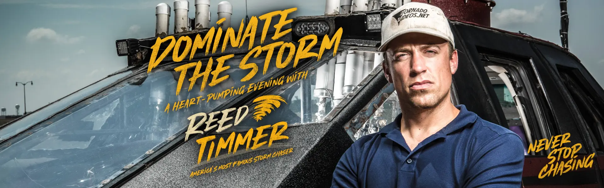 Reed Timmer storm chasing event promotional image featuring Reed Timmer standing beside a storm chasing vehicle.