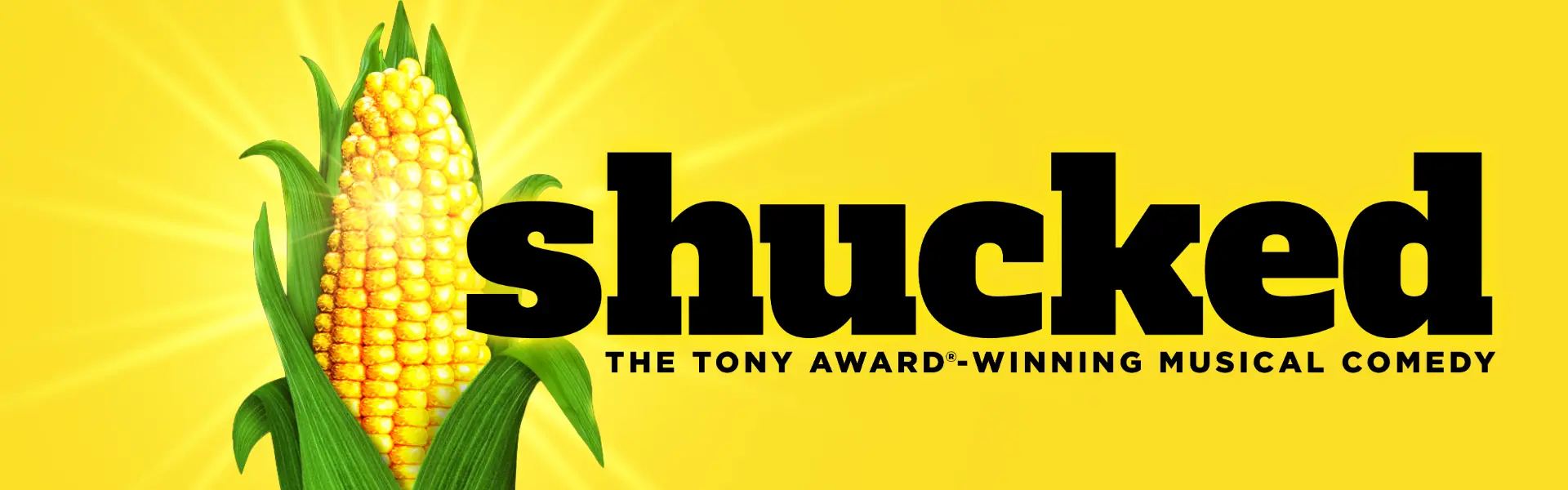 Shucked musical promotional image featuring an ear of corn and bright yellow background.
