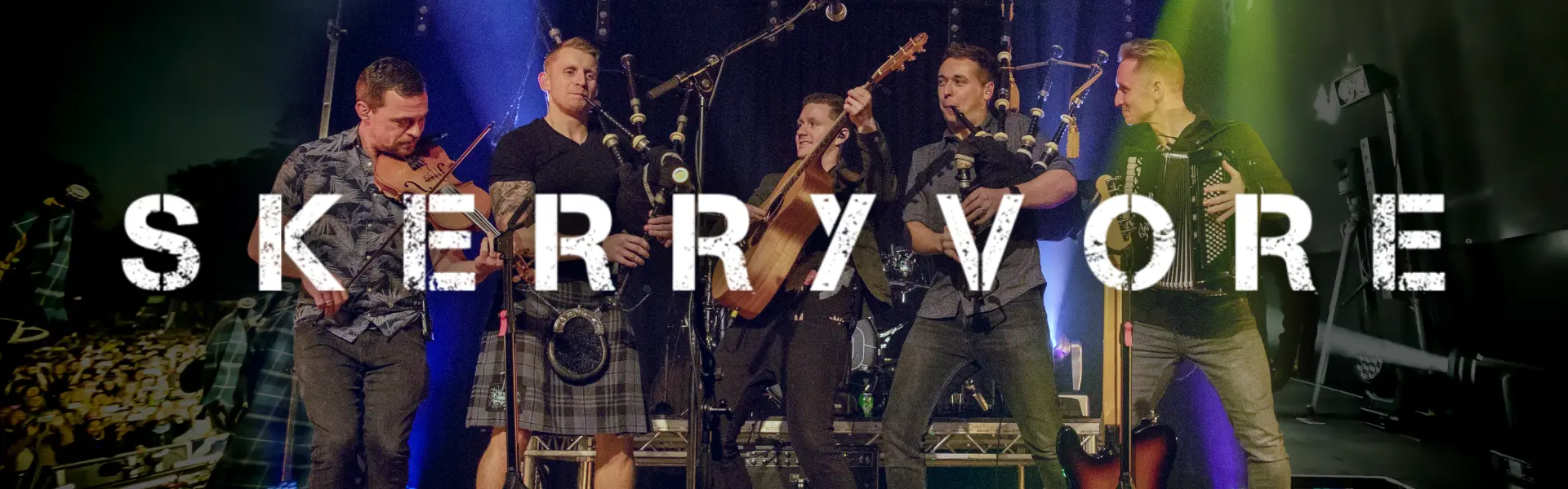 Skerryvore concert promotional image featuring band members performing live on stage with instruments.