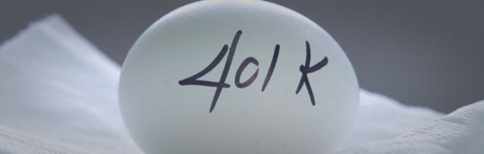 Photo of an egg with 401k written on it to symbolize a nest egg.