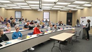 Photo of students in forum classroom in McAllister Hall