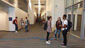 Photo students in the hallways of the STEM Center