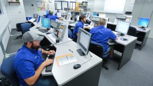 Photo of students in Industrial Systems Technology Lab