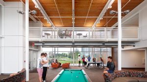 Photo of a students in the recreation area of the Campus View Housing Complex