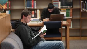 Photo of students studying in the Beem Center library