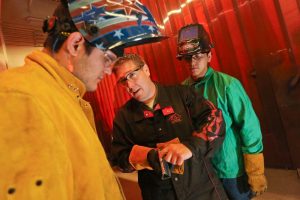 Picture of students learning welding techniques