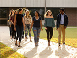 A group of students walking on campus