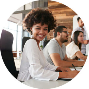 Young african woman sitting at a business presentation