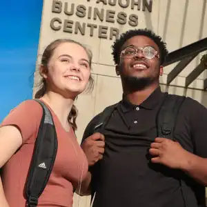 Photo of NIACC students in front of Business building