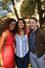 A group of students posing for a picture in front of the Activity Center