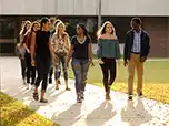 A group of students walking on campus