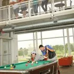 Picture of students playing pool