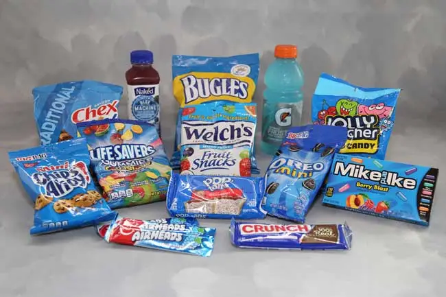 Picture of various food and drink items including Chex Mix, Bugles, Mini Chips Ahoy, Life Savers, Fruit Snacks, Jolly Rancher Candy, Mike and Ike, Mini Oreo, Pop Tarts, Airheads, Crunch Candy Bar, Juice, and Gatorade