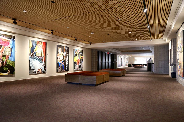 Photo of the meeting space in the Auditorium Gallery featuring artwork from rotating artists