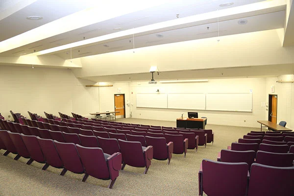 Photo from the back of meeting room BC200 featuring theater style seating